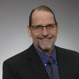 Headshot of Thomas Akre, DO